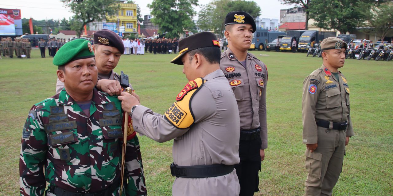 Apel Gelar Pasukan OMP Siginjai 2024 Pengamanan Pilkada Tahun 2024 yang dipimpin langsung oleh Kapolresta Jambi Kombes Pol Eko Wahyudi