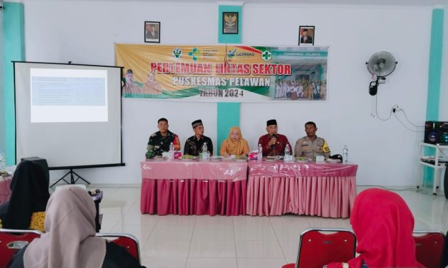 Babinsa Sertu Ilallazi Mewakili Danramil Hadiri Pertemuan Lintas Sektor di Puskesmas Pelawan