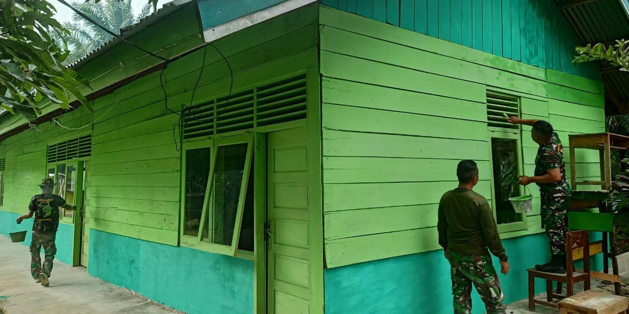 Bangunan Madrasah Darul Ulum Diperindah Anggota Satgas TMMD ke 122 Kodim 0420 Sarko