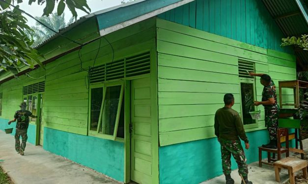 Bangunan Madrasah Darul Ulum Diperindah Anggota Satgas TMMD ke 122 Kodim 0420 Sarko