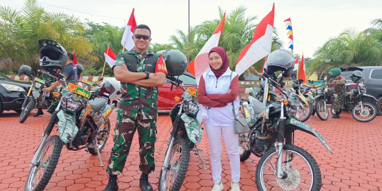 Patroli Merah Putih Kodim 0416/Bute: Kobarkan Nasionalisme, Tebar Kepedulian di Tengah Hujan