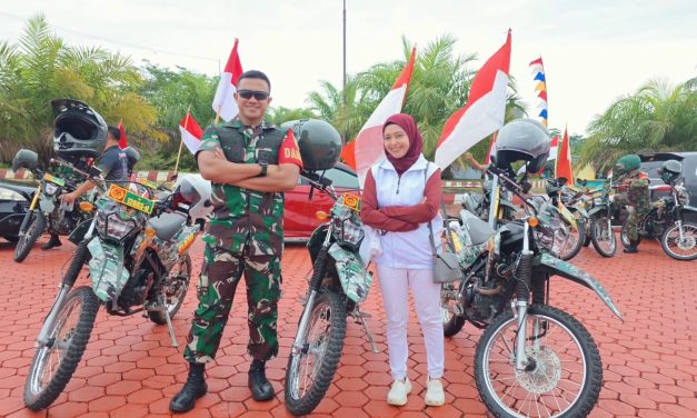 Patroli Merah Putih Kodim 0416/Bute: Kobarkan Nasionalisme, Tebar Kepedulian di Tengah Hujan