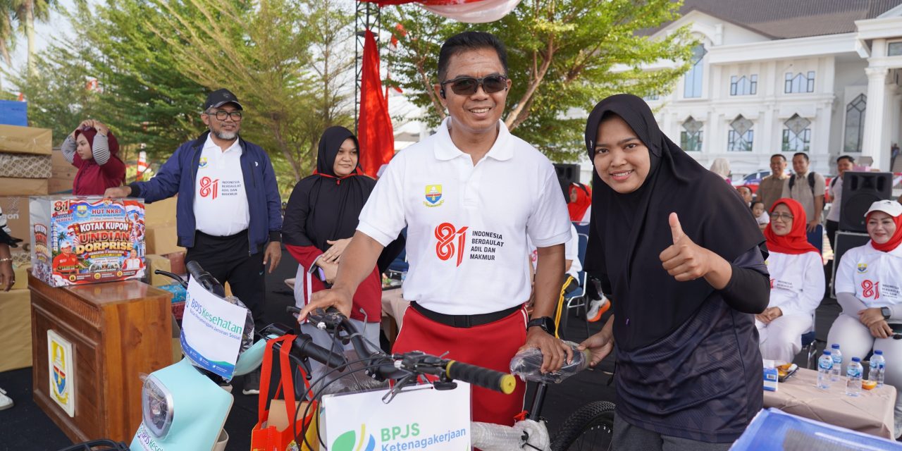 Semarak HUT RI Ke-81, Danrem 042/Gapu Ikuti Gerak Jalan Dan Senam Bersama Di Lapangan Garuda
